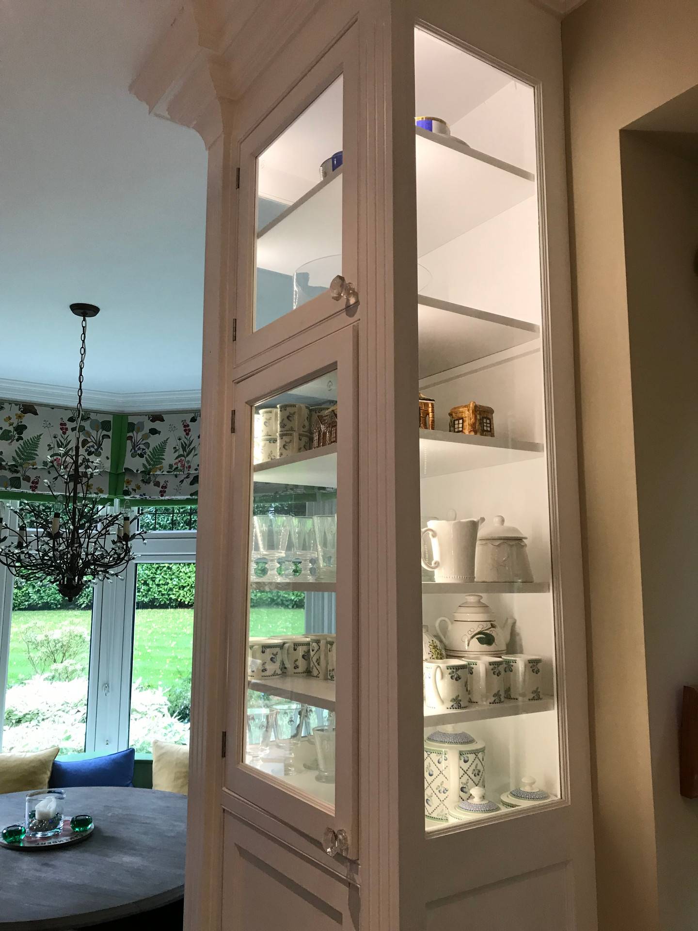 Glass-sided cabinets letting light through