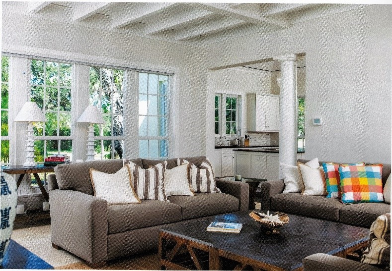 Sabal Palm Lane — an outdoor seating area by the pool